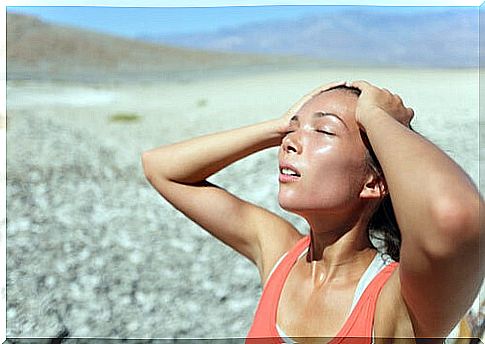 woman sweating in the heat