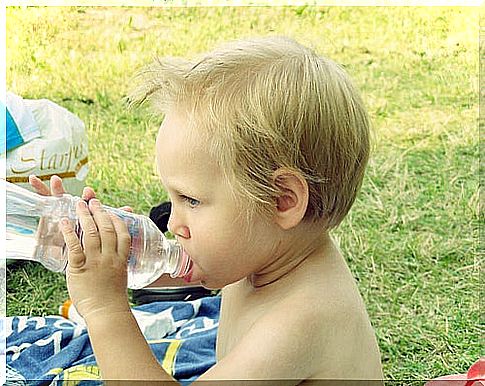 child practicing the act of drinking water