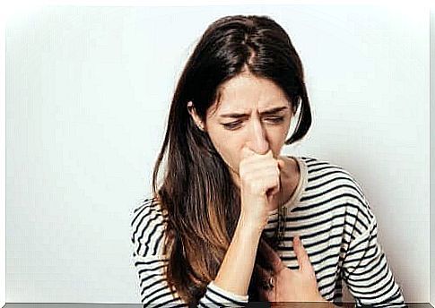 Woman coughing.