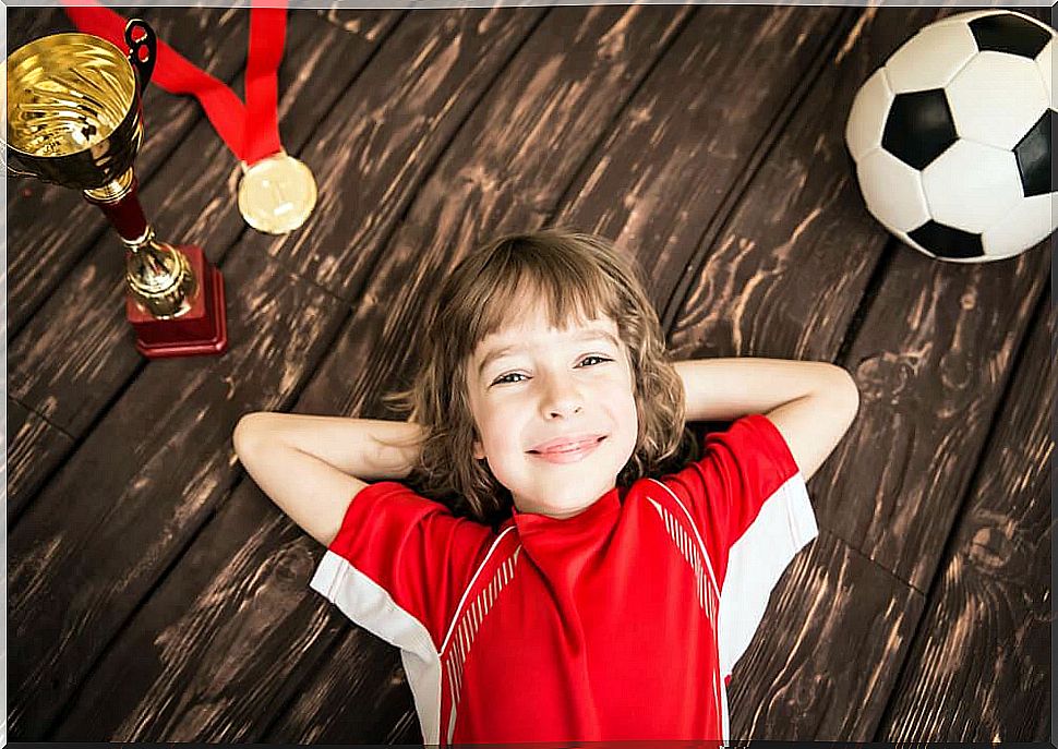 Congratulate your child when he wins and achieves goals