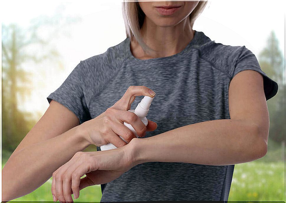 Girl applying homemade anti-mosquito lotion