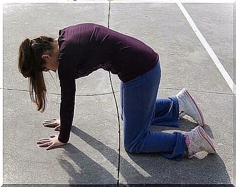 woman doing cat posture