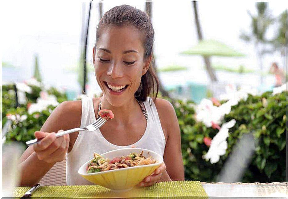 woman eating tuna