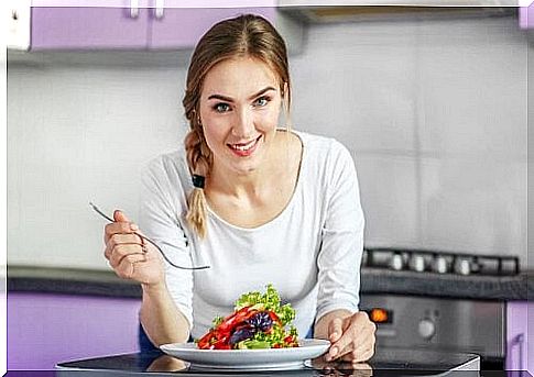 woman eating salad